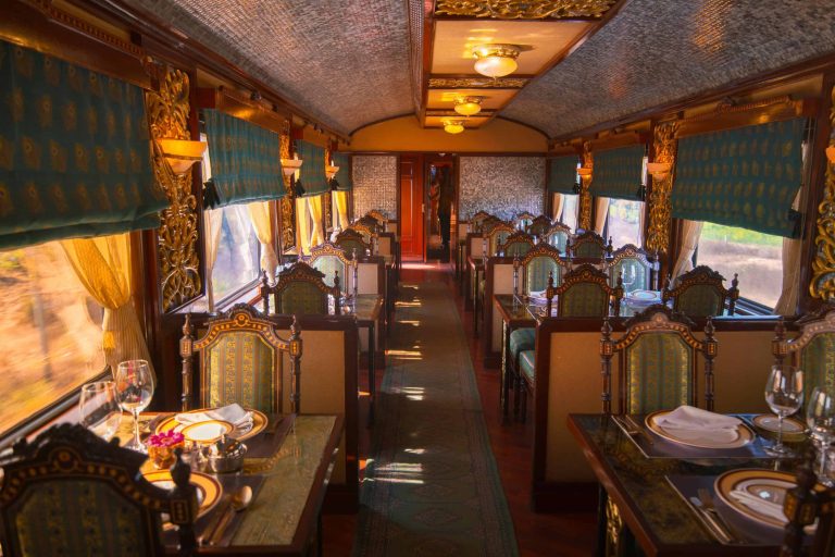 maharajas express train green dining room scaled